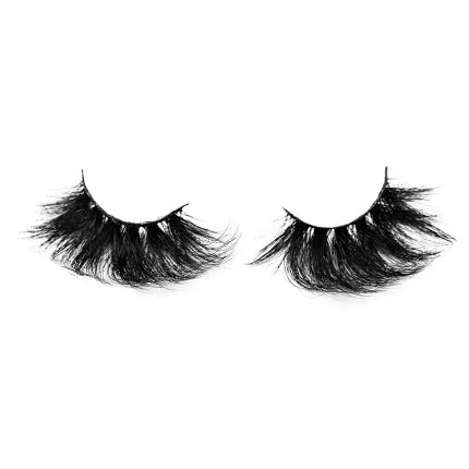 A close-up shot of a set of black cosmetic eyelashes.